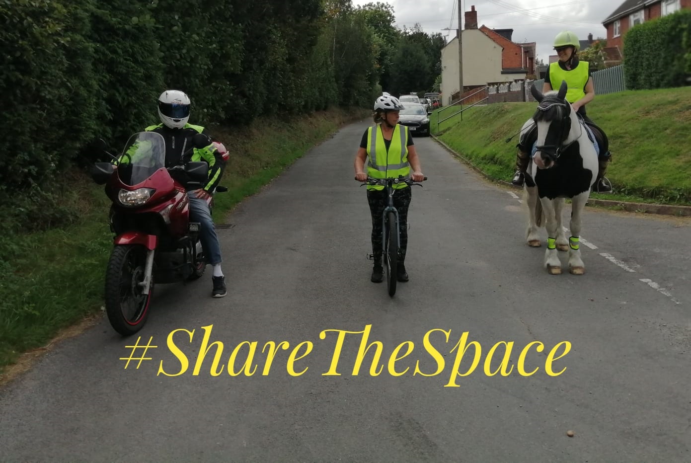 share the space photo motorcyclist cyclist and horse rider