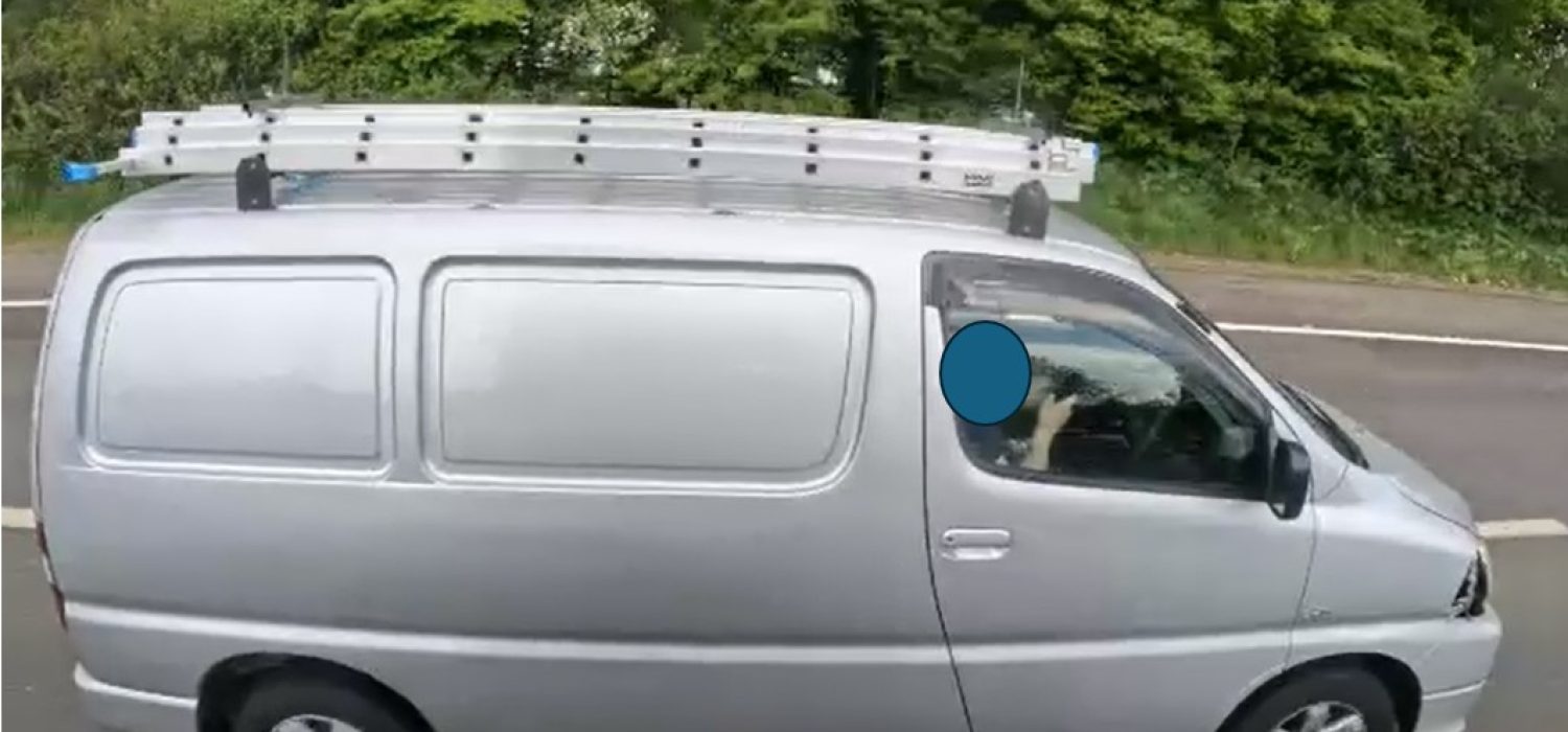 silver van blurred face